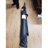 A FISHING BAG CONTAINING ASSORTED RODS SUCH AS CARP ROD BEACH CASTER SPINNING RODS ETC