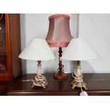 A PAIR OF BRASS AND MARBLE TABLE LAMPS TOGETHER WITH ONE OTHER