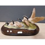 MOUNTED MODEL OF 4 CANADA GEESE IN THE STYLE OF THE LEONARDO COLLECTION