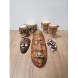LARGE AND 2 SMALL ETHNIC HAND CARVED WALL MASK TOGETHER WITH 4 BONGO DRUMS