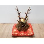 REPRO JAPANESE SAMURAI KABUTO DEER HELMET DISPLAYED ON ORIENTAL STYLE CUSHION