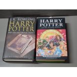 TWO FIRST EDITION HARRY POTTER HARDBACK BOOKS WITH PROTECTIVE COVERS THE DEATHLY HALLOWS AND THE