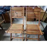 PAIR OF FOLDING WOODEN GARDEN CHAIRS