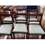 A SET OF 6 REGENCY REPRODUCTION SABRE LEGGED DINING CHAIRS INCLUDES 2 CARVERS