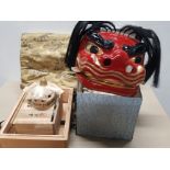 2 JAPANESE HAND CARVED AND PAINTED WOODEN LION MASKS PLUS SILK BAG BOTH IN ORIGINAL BOXES