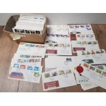 BOX CONTAINING BRITISH FIRST DAY COVERS DATES RANGE FROM 1984-1991 A DUPLICATED RANGE OF OVER 200