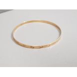 9CT GOLD STAR PATTERNED SLAVE BANGLE 6.2G