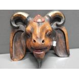 CARVED AND PAINTED WOOD MASK OF A GOAT