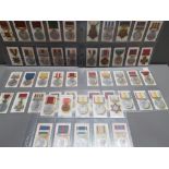 COMPLETE SET OF 50 GOOD TO FINE CONDITION TADDY CIGARETTE CARDS 1912 BRITISH MEDALS AND RIBBONS