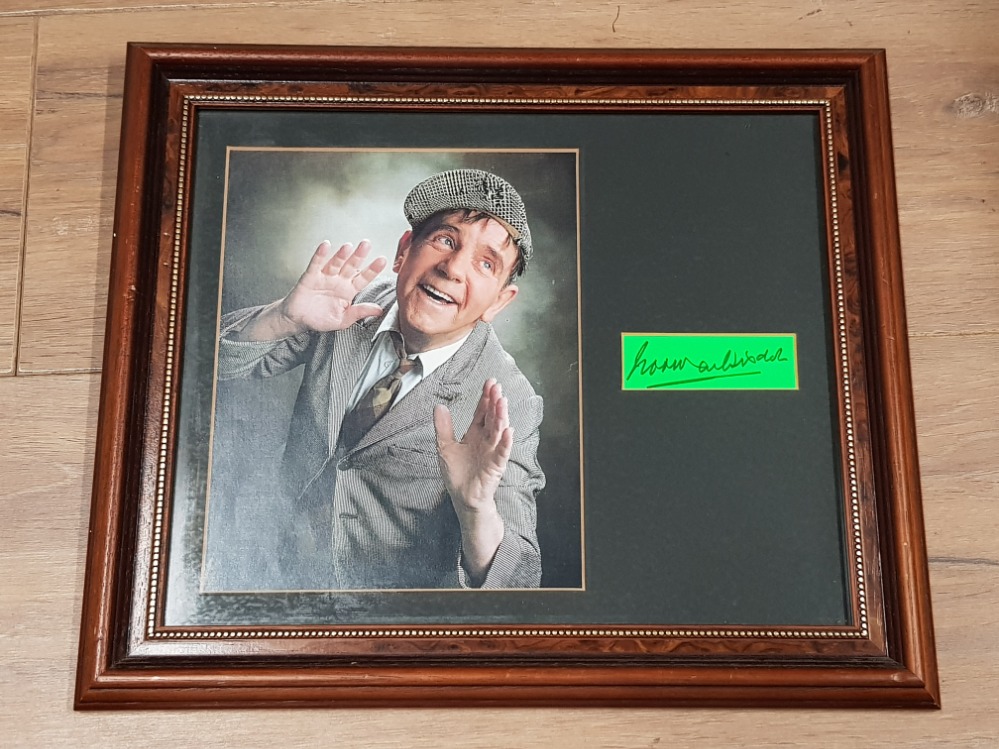 NORMAN WISDOM AUTOGRAPH TOGETHER WITH HIS PHOTOGRAPH IN FRAME