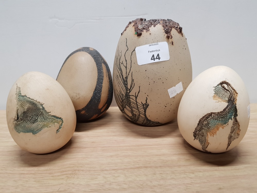 FOUR STUDIO POTTERY EGGS ALL WITH WEB DECORATION 2 SIGNED BY ALISON BORTHWICK AND ONE BY RAY NASH