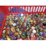 A TRAY OF ASSORTED MARBLES