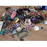 CRATE CONTAINING A LARGE QUANTITY OF COSTUME JEWELLERY SIMULATED BEADS, BANGLES AND EARRINGS