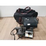 A BAG CONTAINING CAMERA BAGS AND 2 POLAROID LAND CAMERAS