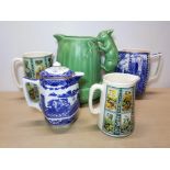 5 ITEMS INC RINGTONS CERAMIC JUGS AND A GREEN SYLVAC VASE WITH A SQUIRREL HANDLE