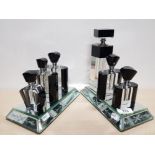 6 DECORATIVE PERFUME AND AFTERSHAVE BOTTLES ON MIRRORED PLINTHS SAS
