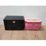 A BLACK JEWELLERY CHEST TOGETHER WITH A PINK JEWELLERY CHEST