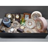 TRAY CONTAINING MISCELLANEOUS MINATURE MANTLE CLOCKS AND TIME PIECES ALSO INCLUDES TABLE LIGHTERS