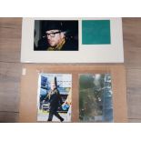 ELVIS COSTELLO SIGNATURE ACCOMPANIED WITH 3 PHOTOGRAPHS DISPLAYED ON 2 DIFFERENT ITEMS BOTH 23CM X