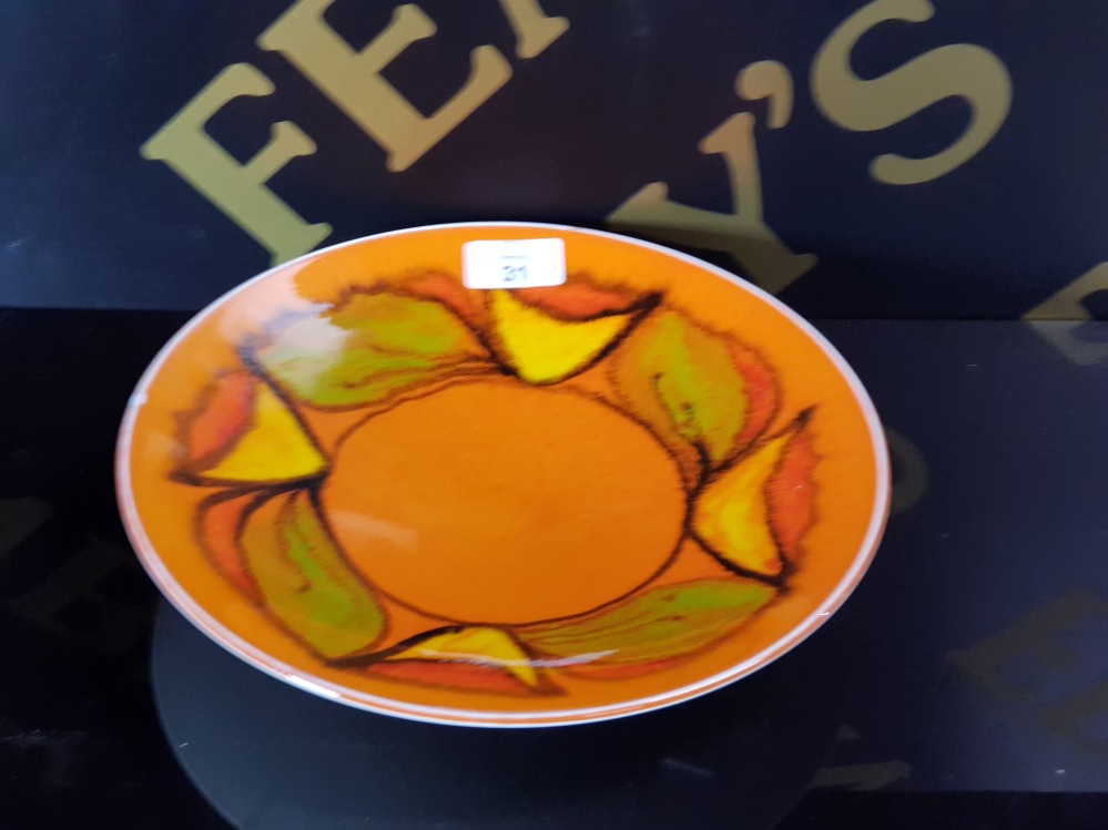 A POOLE POTTERY RED AEGEAN DISH