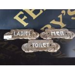 3 CAST METAL SIGNS INC MENS LADIES AND A TOILET SIGN