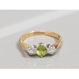 18CT GOLD PERIDOT AND DIAMOND THREE STONE RING 2.5G SIZE L