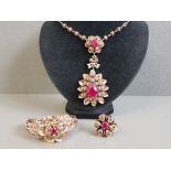 MATCHING ROSE GOLD RUBY AND DIAMOND TRIO SET INCLUDES FLOWER RING, DOUBLE CLUSTER NECKLACE AND