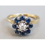 18CT GOLD DIAMOND AND SAPPHIRE CLUSTER RING 4.4G SIZE N