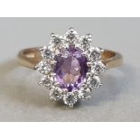 9CT YELLOW GOLD PURPLE STONE AND CUBIC CLUSTER RING 3.4G SIZE O
