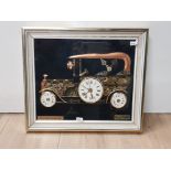 A FRAMED ROLLS ROYCE SILVER GHOST WALL CLOCK MADE OUT OF POCKET WATCH PARTS 38CM BY 33CM
