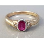 9CT YELLOW GOLD RUBY AND TWO DIAMOND RING 3.1G SIZE O1/2