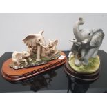 MOTHER ELEPHANT AND 2 CALFS ORNAMENT BY THE LEONARDO COLLECTION WITH ONE OTHER ELEPHANT FIGURE