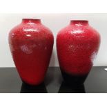 PAIR OF RED DARK CRYSTAL VASES BY STUART STRATHEARN AND DESIGNED BY IESTYN DAVIES