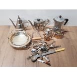 A TRAY OF SILVER PLATED ITEMS SUCH AS TEAPOTS CUTLERY ETC