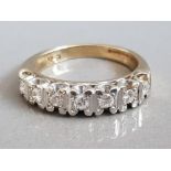 9CT GOLD DIAMOND HALF ETERNITY RING APPROXIMATELY. 25CT GROSS WEIGHT 3G SIZE K1/2