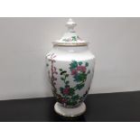 COALPORT LIDDED VASE IN THE INDIAN TREE PATTERN 23CM HAIRLINE CRACK ON RIM