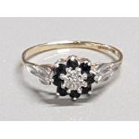9CT GOLD RING WITH CENTRAL DIAMOND AND SURROUNDING SAPPHIRES SIZE S 1.5G