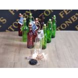 A LARGE QUANTITY OF DECORATIVE LIGHT UP BATTERY POWERED WINE BOTTLES