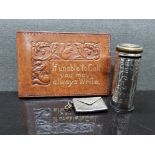 STERLING SILVER STAMPED STAMP ENVELOPE TOGETHER WITH LEATHER STAMP HOLDER AND 1POUND SAVINGS BANK