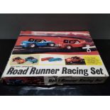 VINTAGE BATTERY OPERATED ROAD RUNNER RACING SET IN ORIGINAL BOX