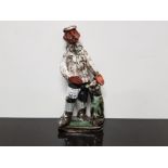 SEVEN SPRINGS POTTERY MARIE WHITBY GOLFER FIGURINE