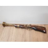 A WOODEN BRASS ORNAMENTAL FLINT LOCK BLUNDERBUSS