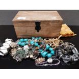 WOODEN BOX CONTAINING MISCELLANEOUS COSTUME JEWELLERY NECKLACES, BRACELETS AND LADIES WRISTWATCH