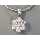 PLATINUM AND DIAMOND PENDANT CONTAINING SEVEN NATURAL DIAMONDS TOTAL WEIGHT 1.00 CARAT, COLOR E-F,