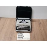 VINTAGE REMINGTON ENVOY TYPEWRITER IN ORIGINAL CARRY CASE