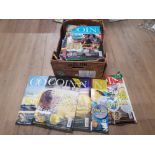 A BOX CONTAINING A LARGE QUANTITY OF COIN NEWS MAGAZINES