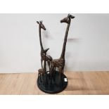 A LARGE STEEL FIGURE OF A FAMILY OF FOUR GIRAFFES 55CM TALL