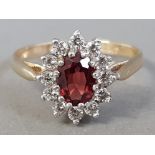 9CT YELLOW GOLD CUBIC ZIRCONIA AND OVAL RED STONE CLUSTER RING 2.2G SIZE P