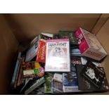 A BOX CONTAINING A LARGE AMOUNT OF DVDS INC THE MAIN EVENT ETC