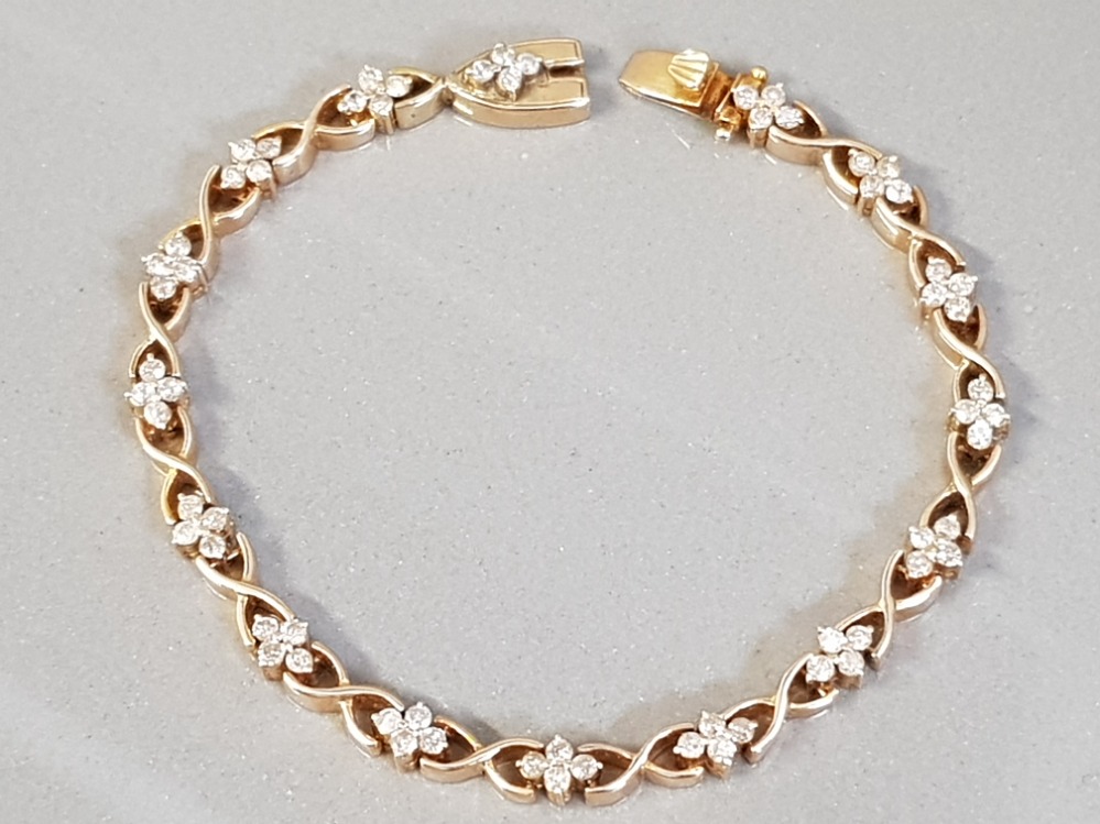 9CT YELLOW GOLD ORNATE DIAMOND CLUSTER BRACELET APPROXIMATELY 7 INCHES IN LENGTH 13.9G